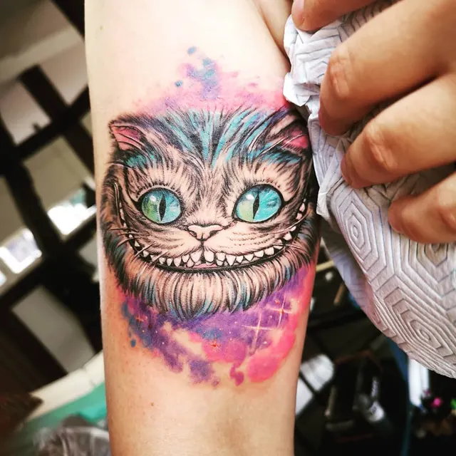 Color and sketchy custom tattoo by Xelo