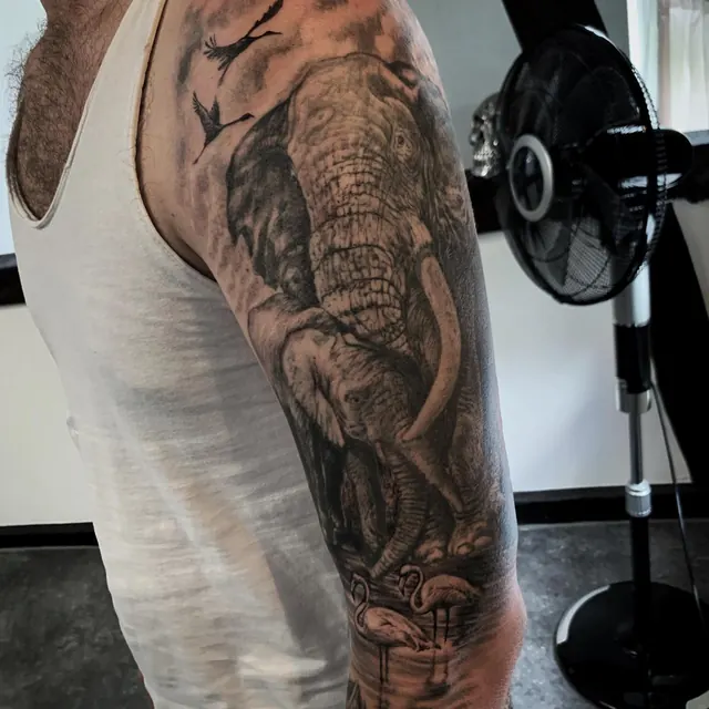 Black and grey realistic tattoo by Xelo
