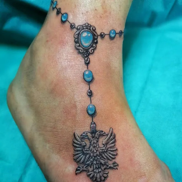 Small fine tattoo by Xelo