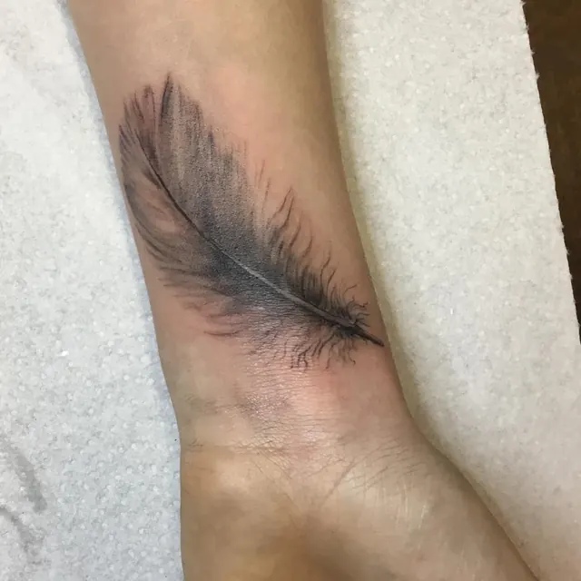 Small fine tattoo by Xelo
